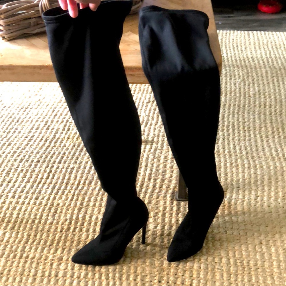 Knee high black ankle boots